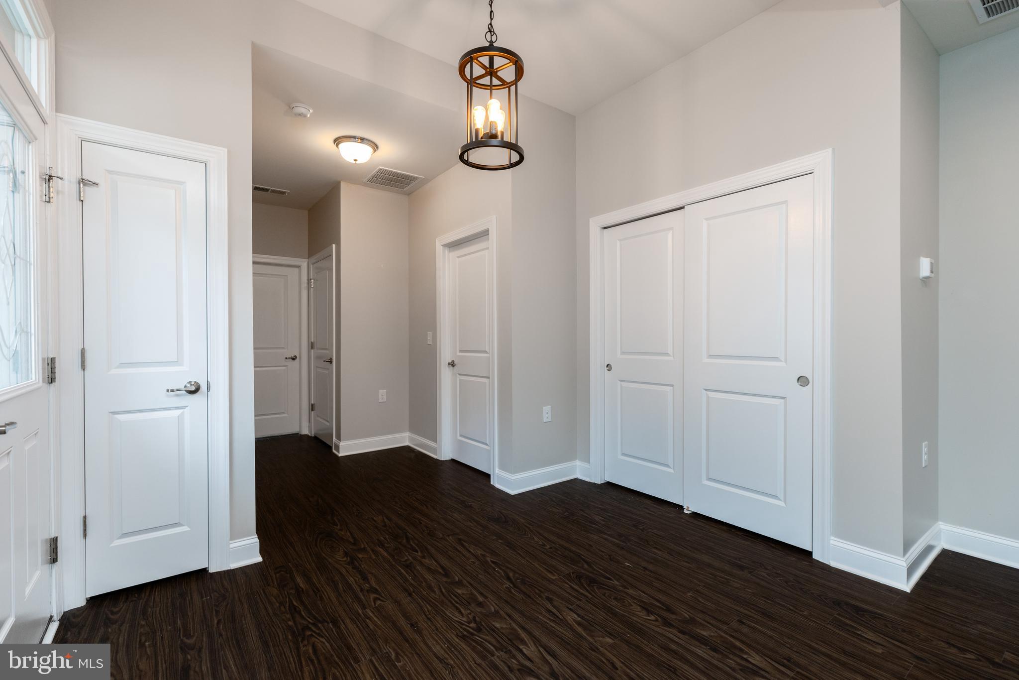 1415 Whispering Woods Road Middletown, DE 19709 - Photo 12 of 42 a view of empty room with wooden floor