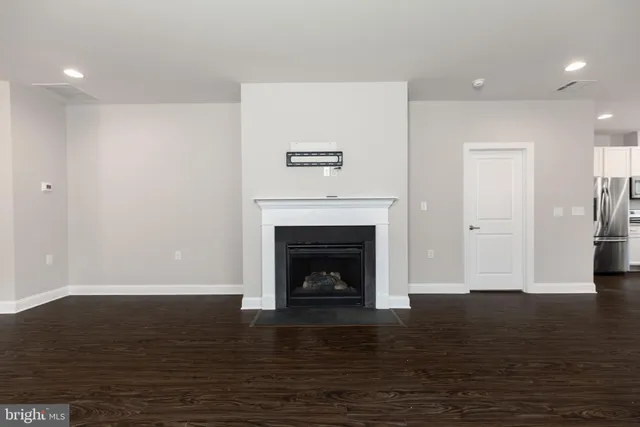 a living room with a fireplace