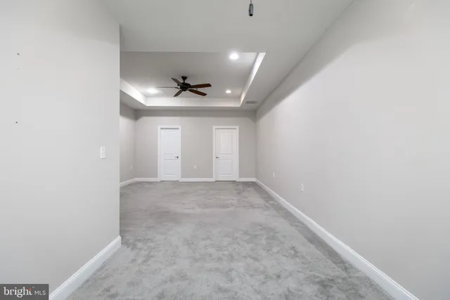 a bathroom with a sink a toilet a shower and a mirror