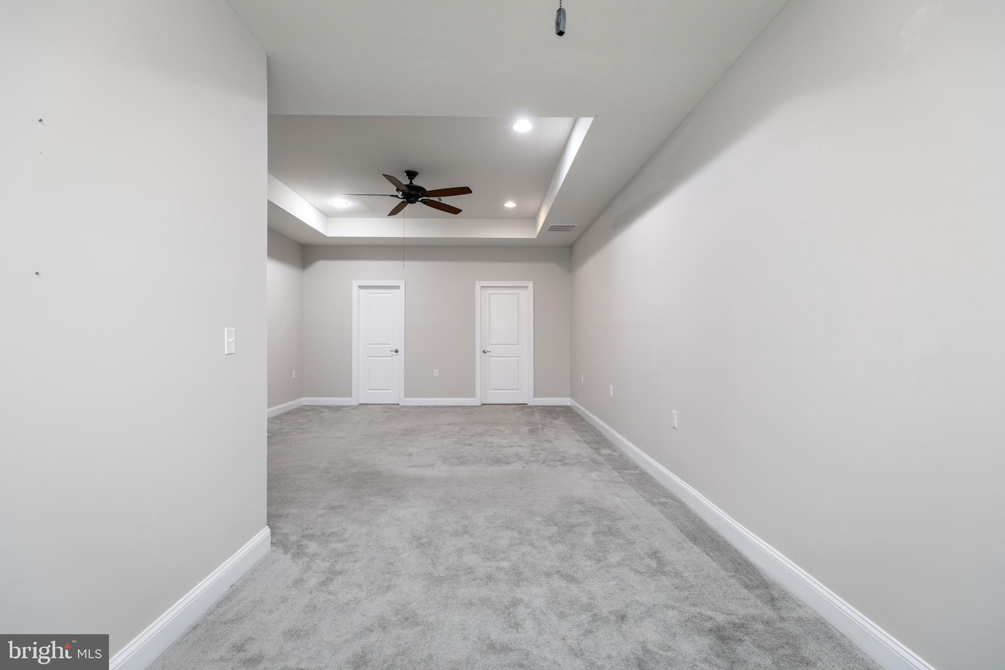 1415 Whispering Woods Road Middletown, DE 19709 - Photo 29 of 42 an empty room with a empty space and windows