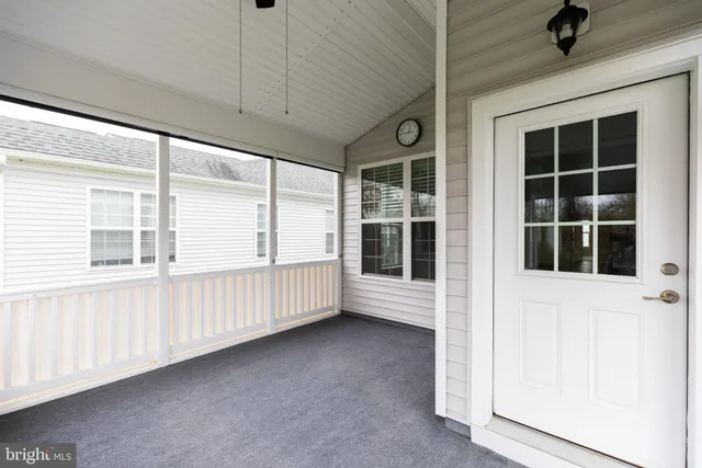 a view of a porch with a yard