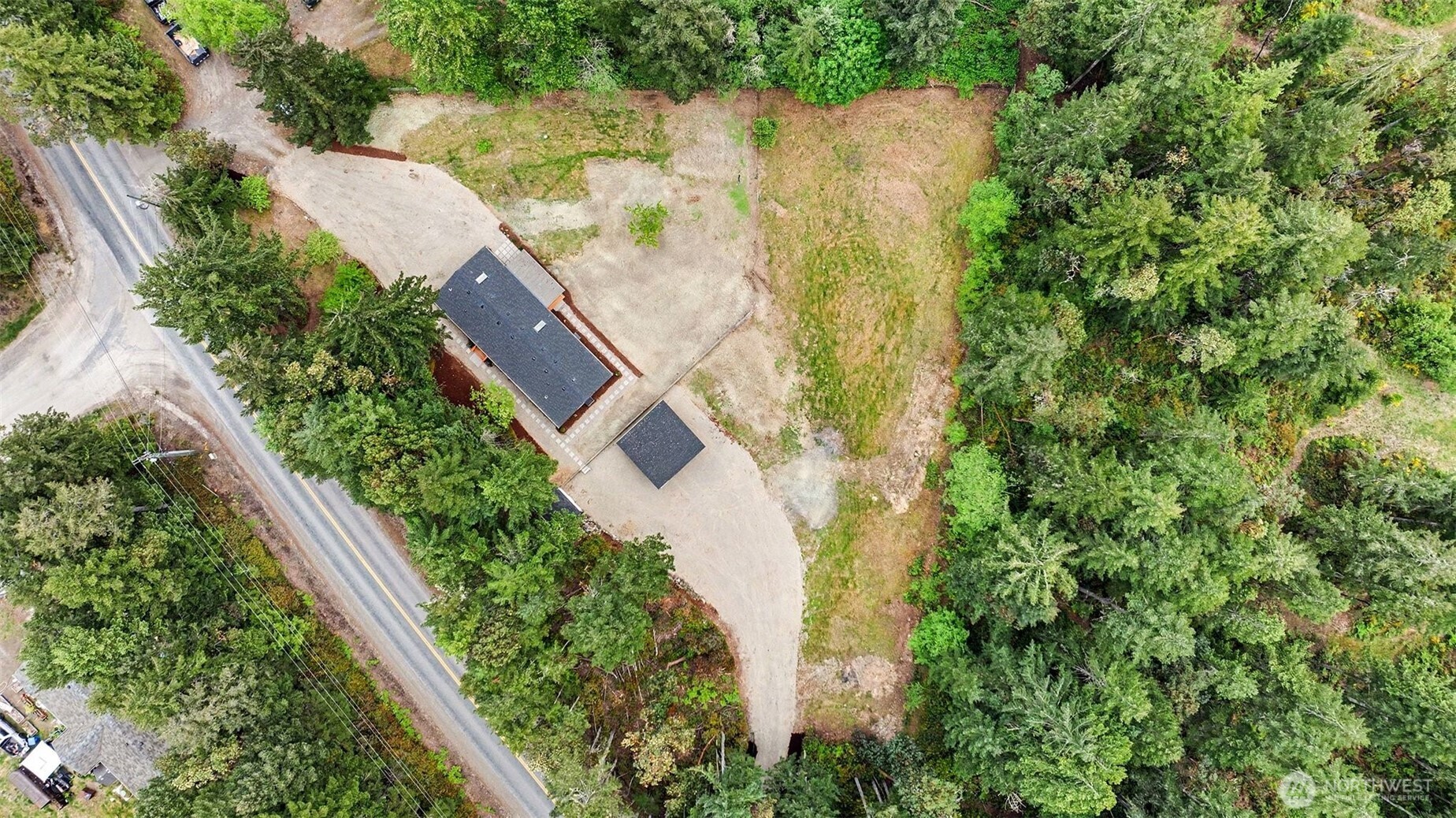 719 Tiedman Road Southwest Lakebay, WA 98349 - Photo 40 of 40 an aerial view of residential house with outdoor space and trees all around