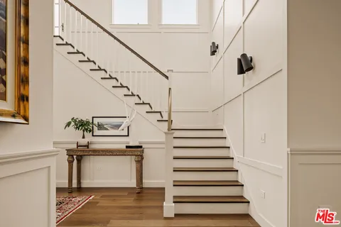 a view of entryway with a front door