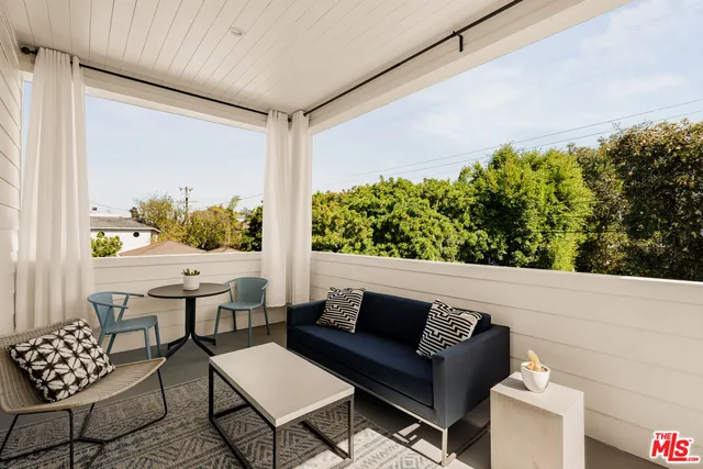 a outdoor living room with furniture