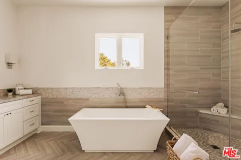 a bathroom with a sink and bathtub