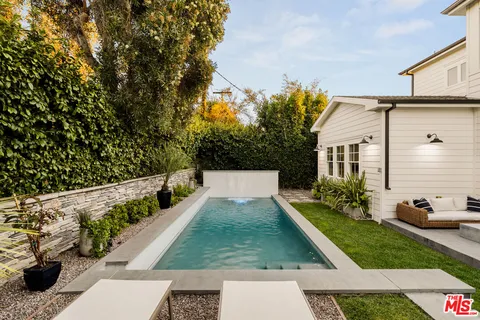 a view of a yard with patio