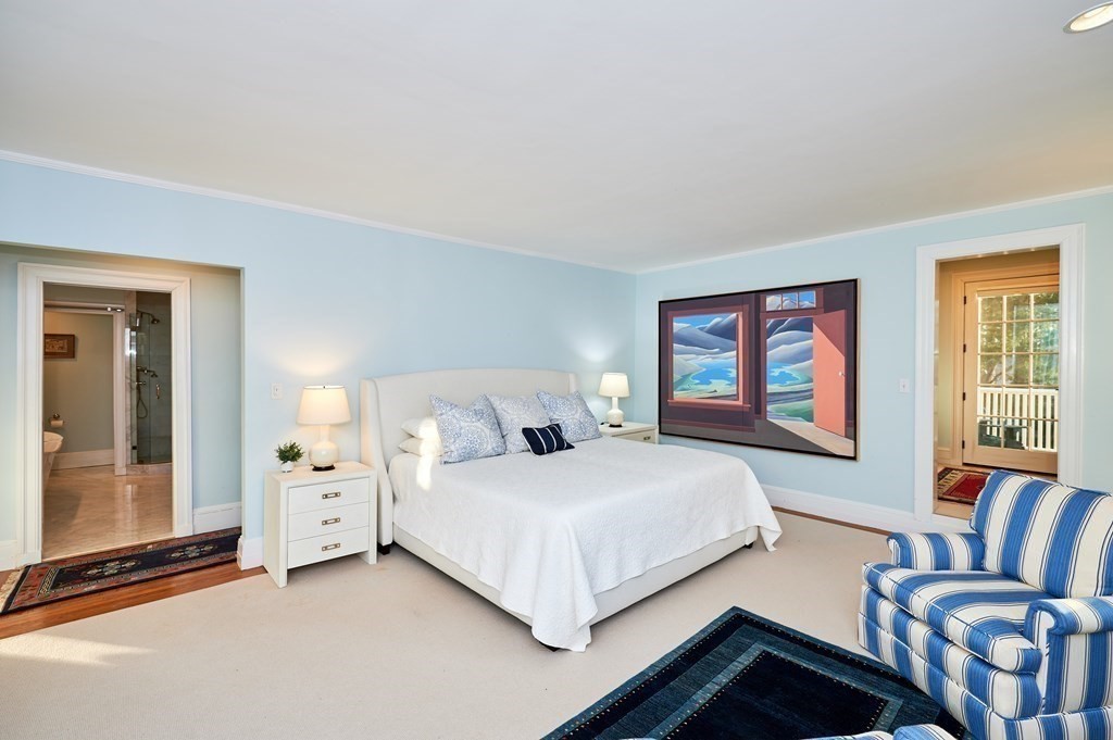 72 Pine Ridge Road Newton, MA 02468 - Photo 19 of 41 a bedroom with a bed and wooden floor