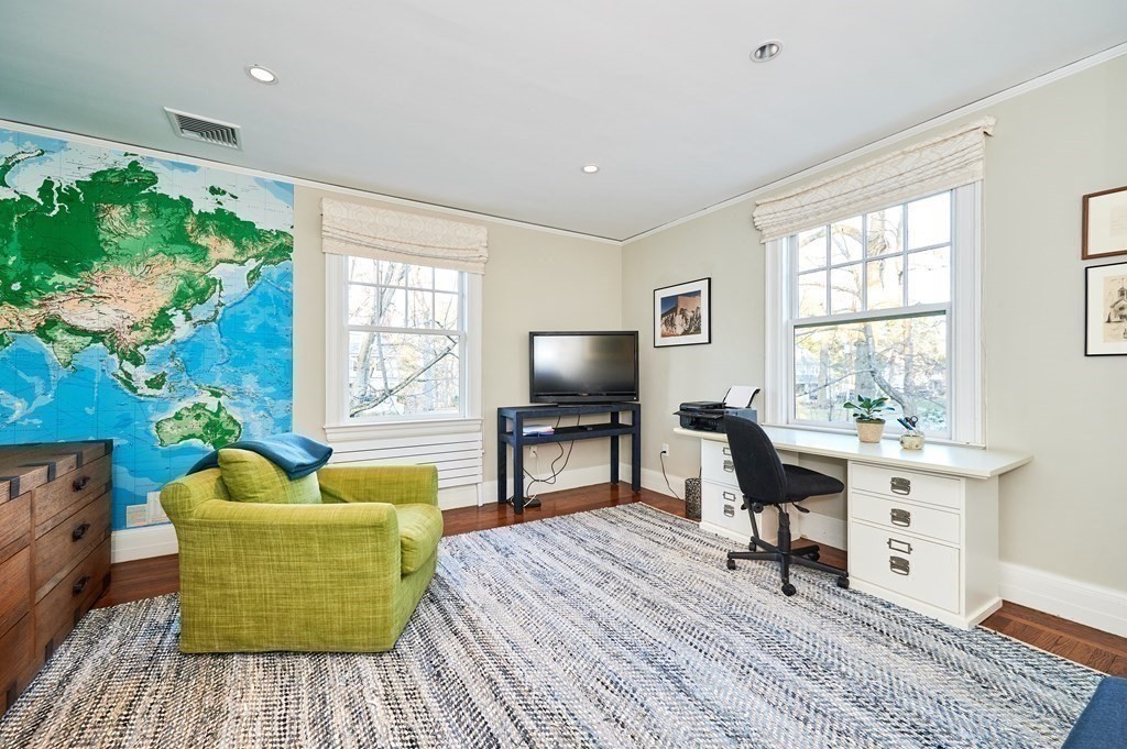 72 Pine Ridge Road Newton, MA 02468 - Photo 26 of 41 a living room with furniture and a flat screen tv