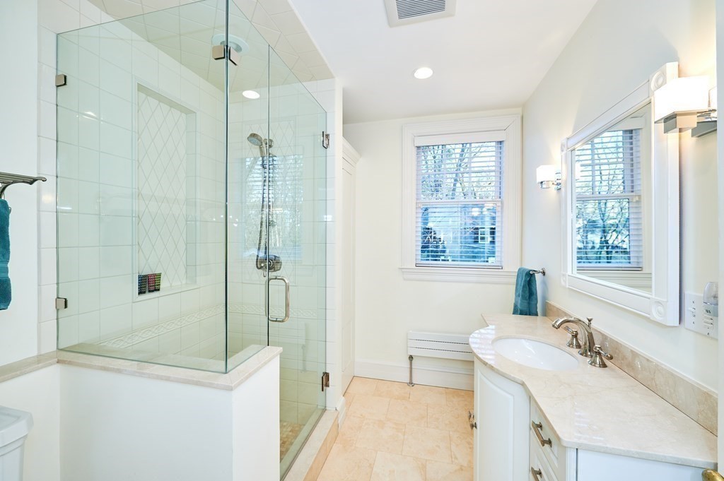 72 Pine Ridge Road Newton, MA 02468 - Photo 28 of 41 a bathroom with a sink a toilet and shower