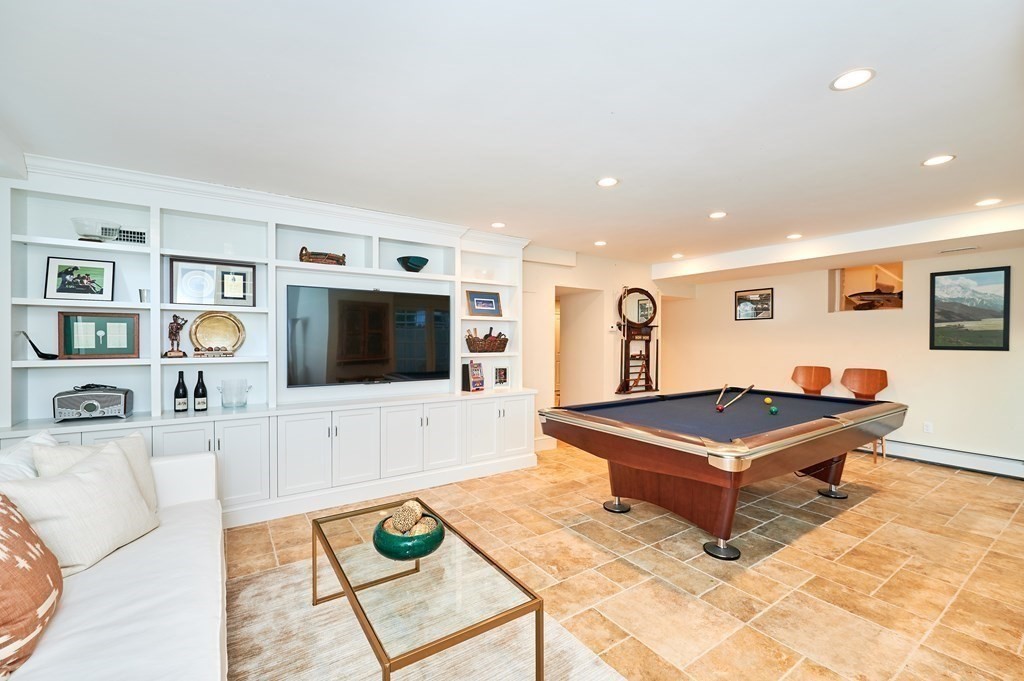 72 Pine Ridge Road Newton, MA 02468 - Photo 34 of 41 a living room with furniture and a flat screen tv