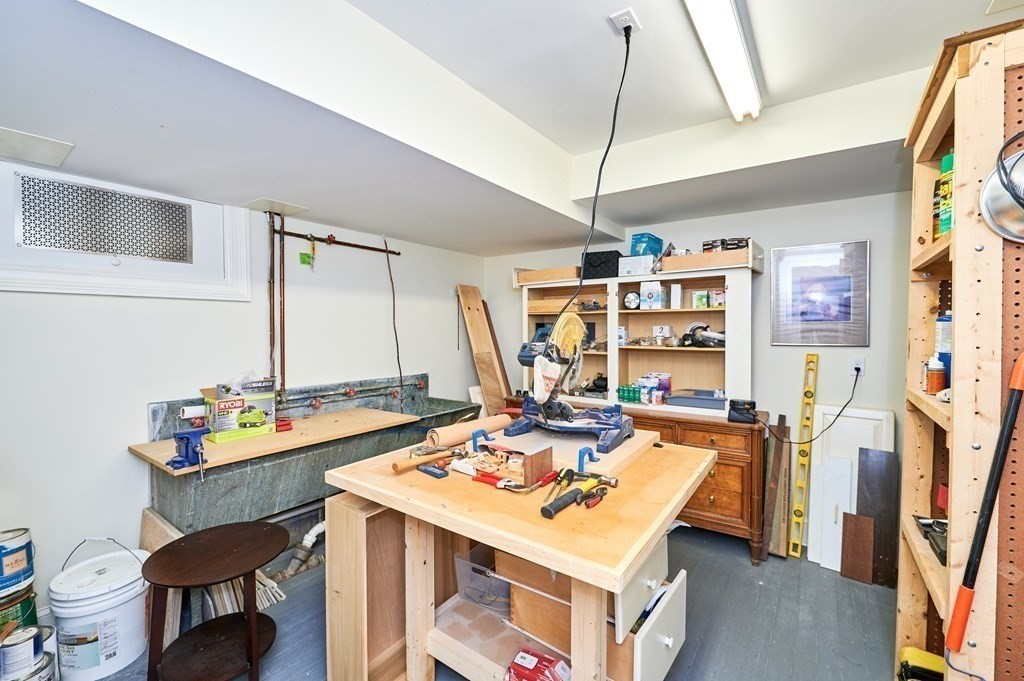 72 Pine Ridge Road Newton, MA 02468 - Photo 36 of 41 a view of a kitchen with a table and chairs