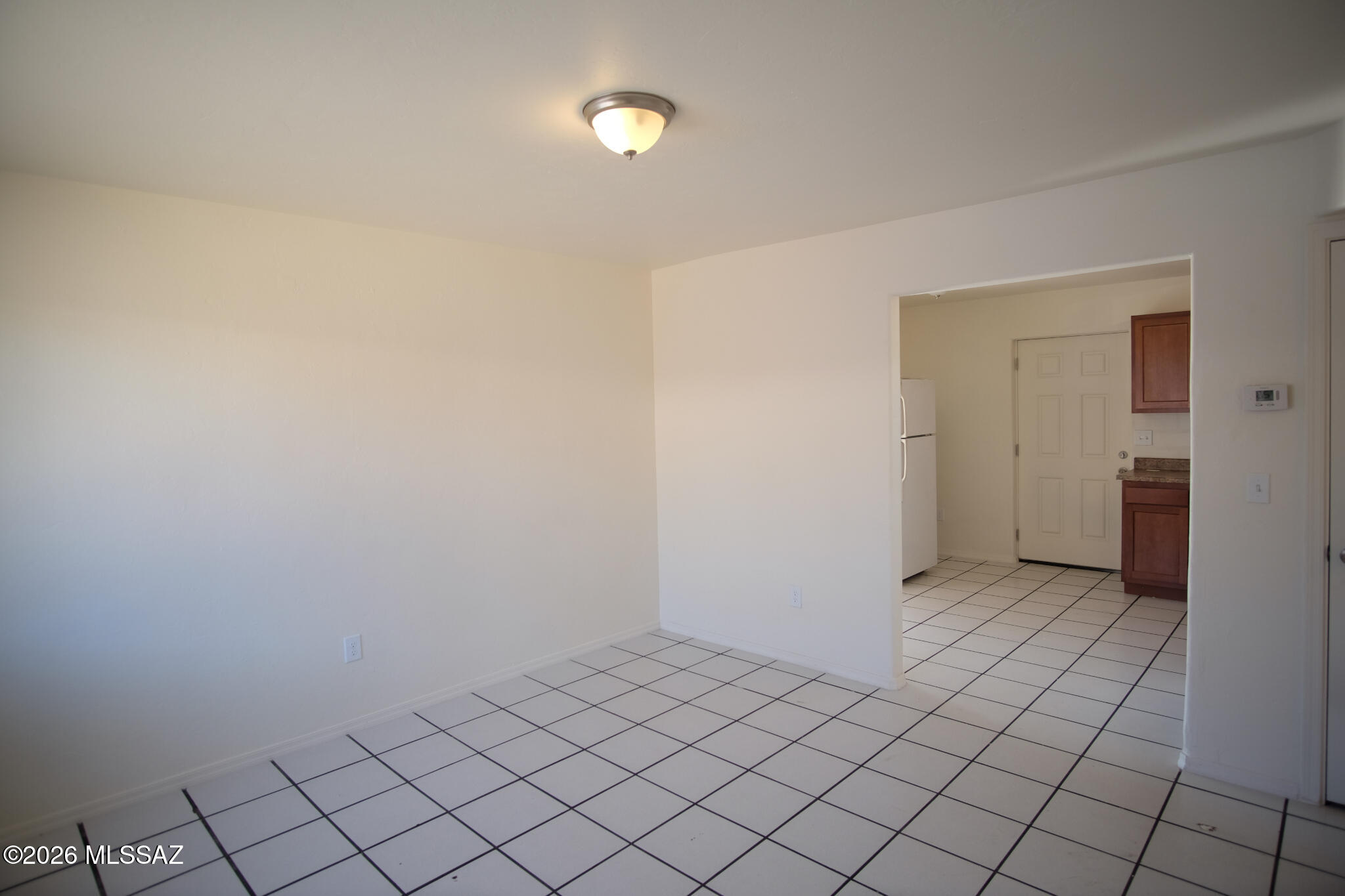345 East Delta Road Tucson, AZ 85706 - Photo 8 of 45 a view of an empty room and window