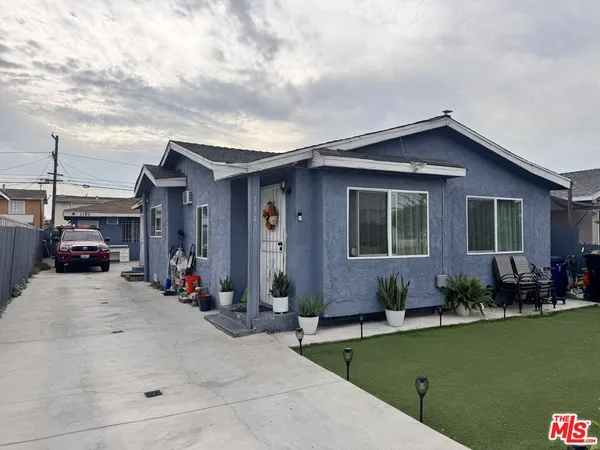 a front view of a house with patio