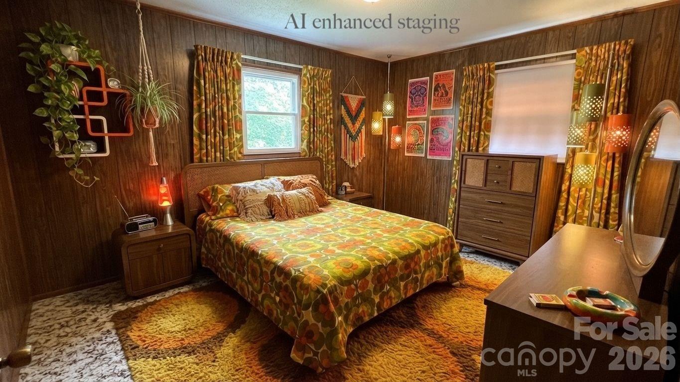 4072 Beach Road Hudson, NC 28638 - Photo 14 of 25 a bedroom with a bed and wooden floor
