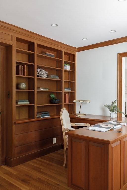 150 Fletcher Road Belmont, MA 02478 - Photo 15 of 33 a room with furniture and a book shelf