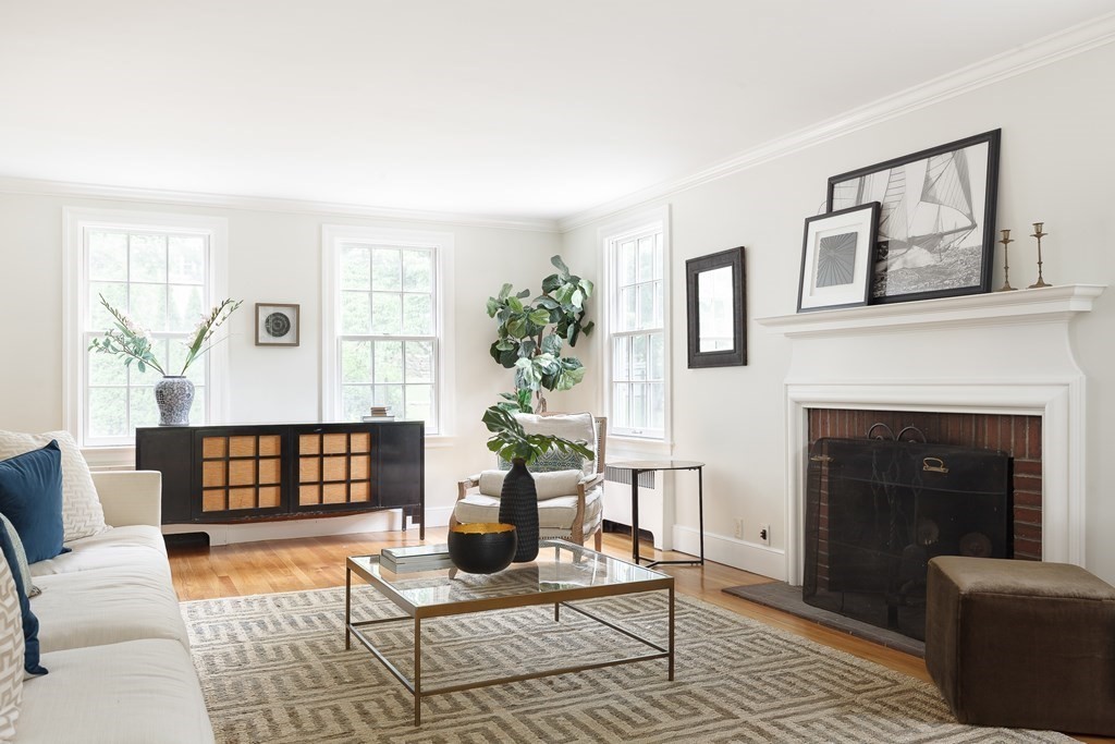 150 Fletcher Road Belmont, MA 02478 - Photo 5 of 33 a living room with furniture and a fireplace