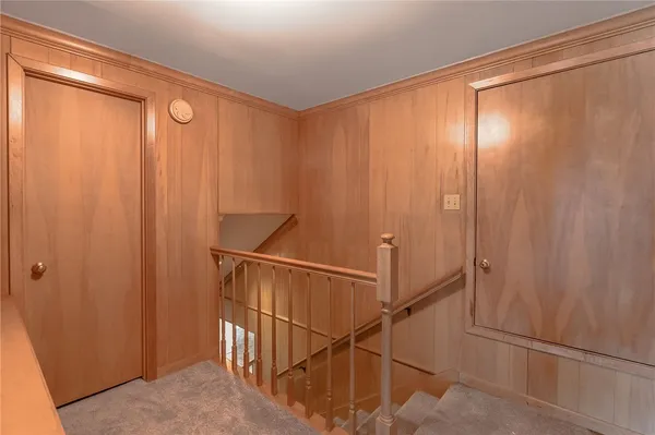 a bathroom with a shower and a shower curtain