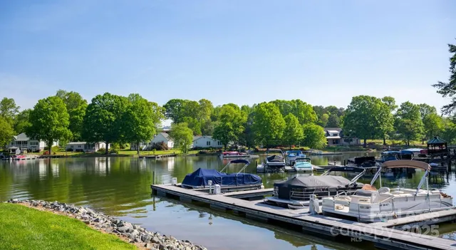 a view of a lake with a house