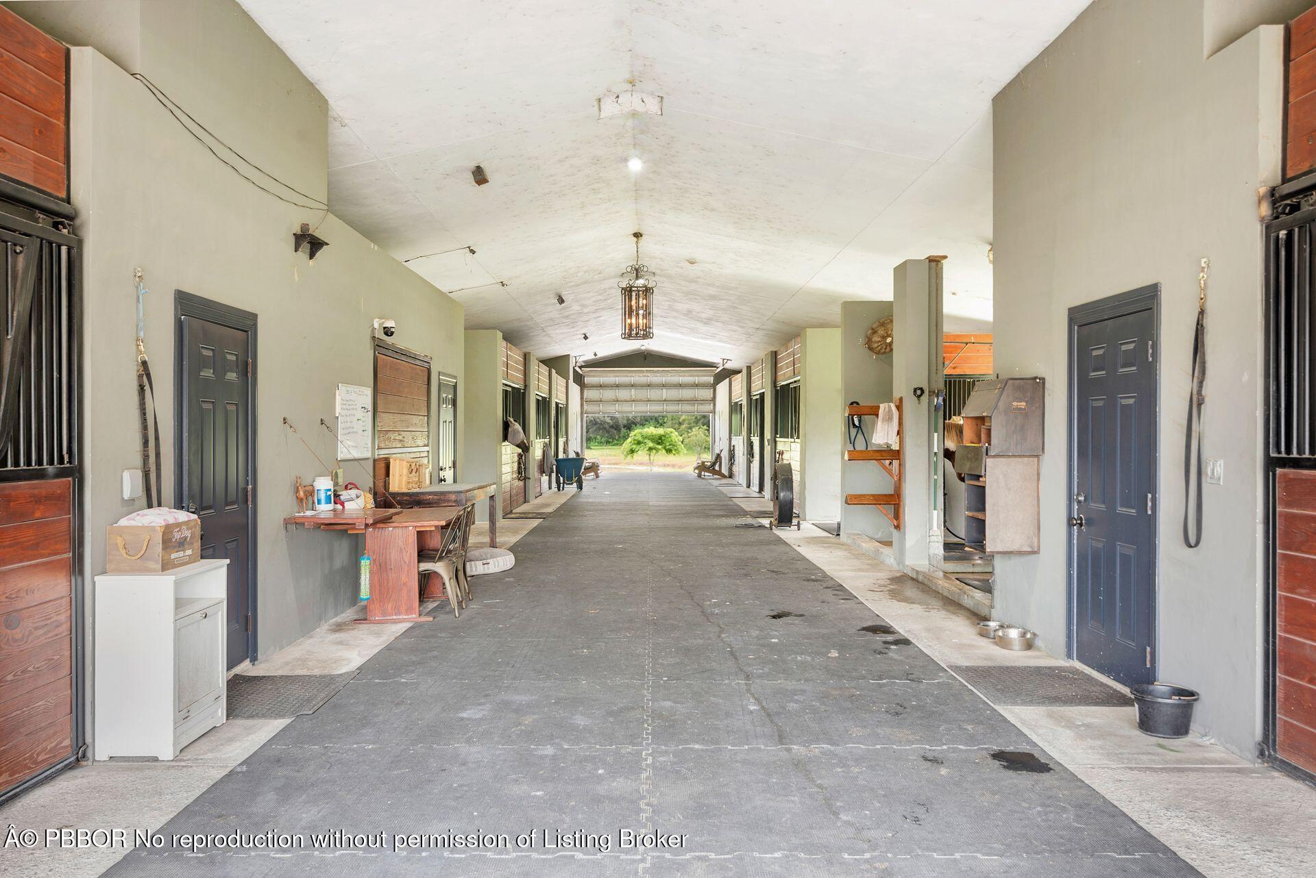 2770 E Road Loxahatchee, FL 33470 - Photo 9 of 51 a view of a living room and entry way