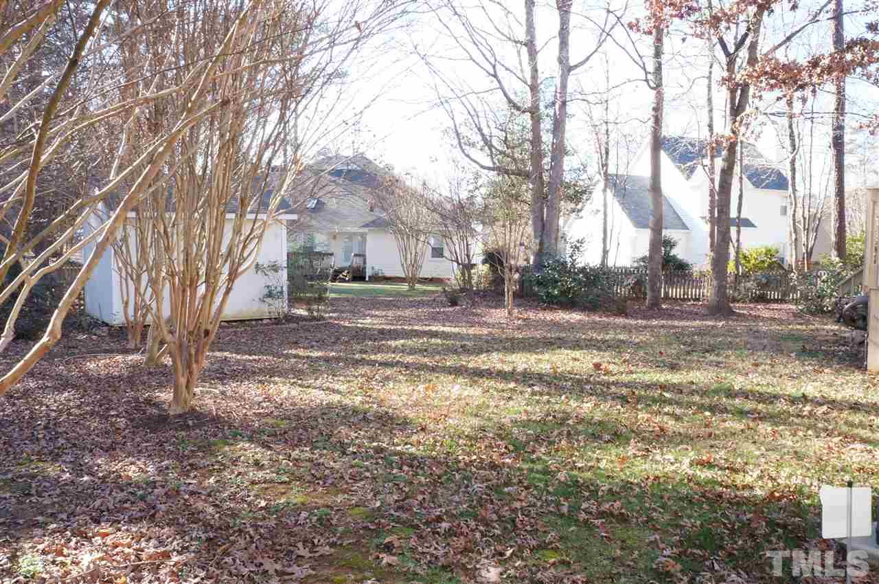 5121 Fairmead Circle Raleigh, NC 27613 - Photo 20 of 21 a view of road with large trees