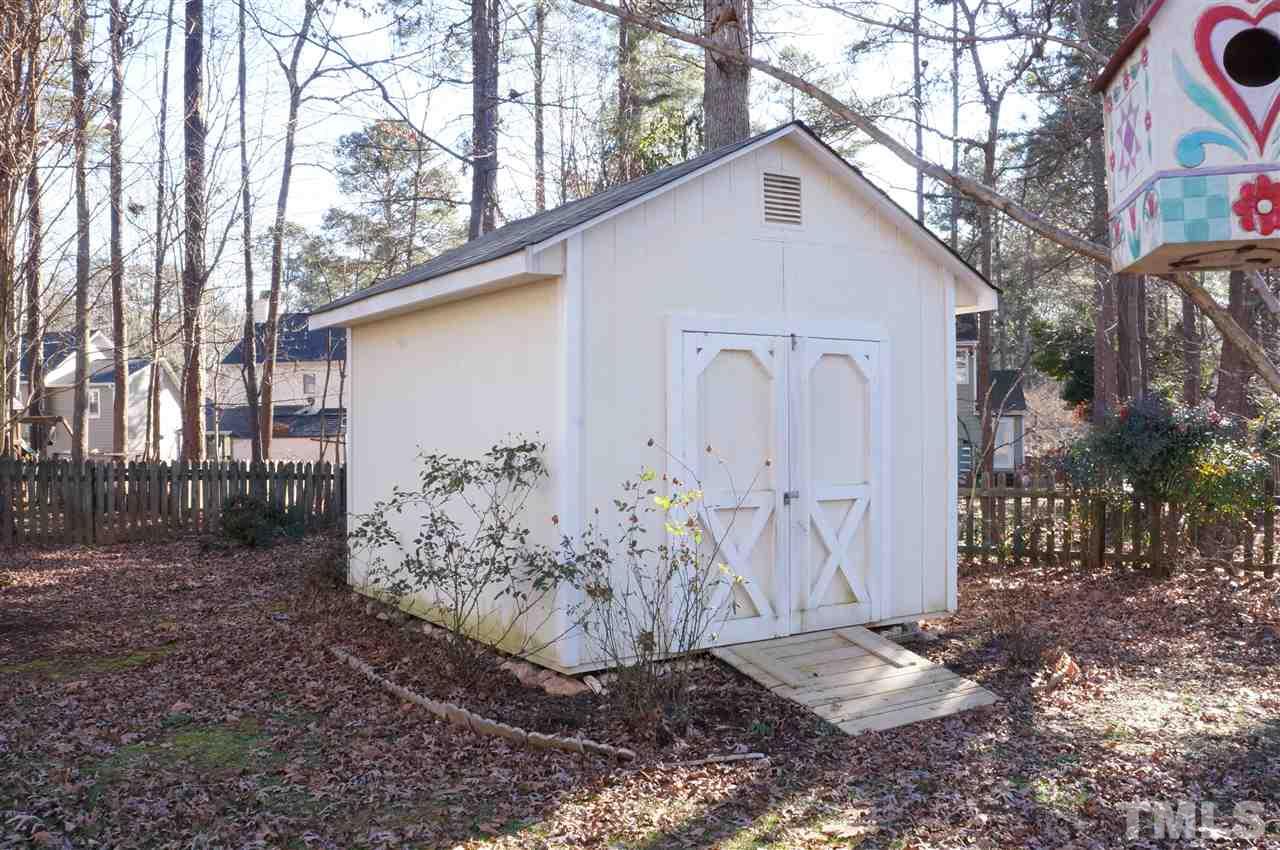 5121 Fairmead Circle Raleigh, NC 27613 - Photo 21 of 21 a view of a house with a yard