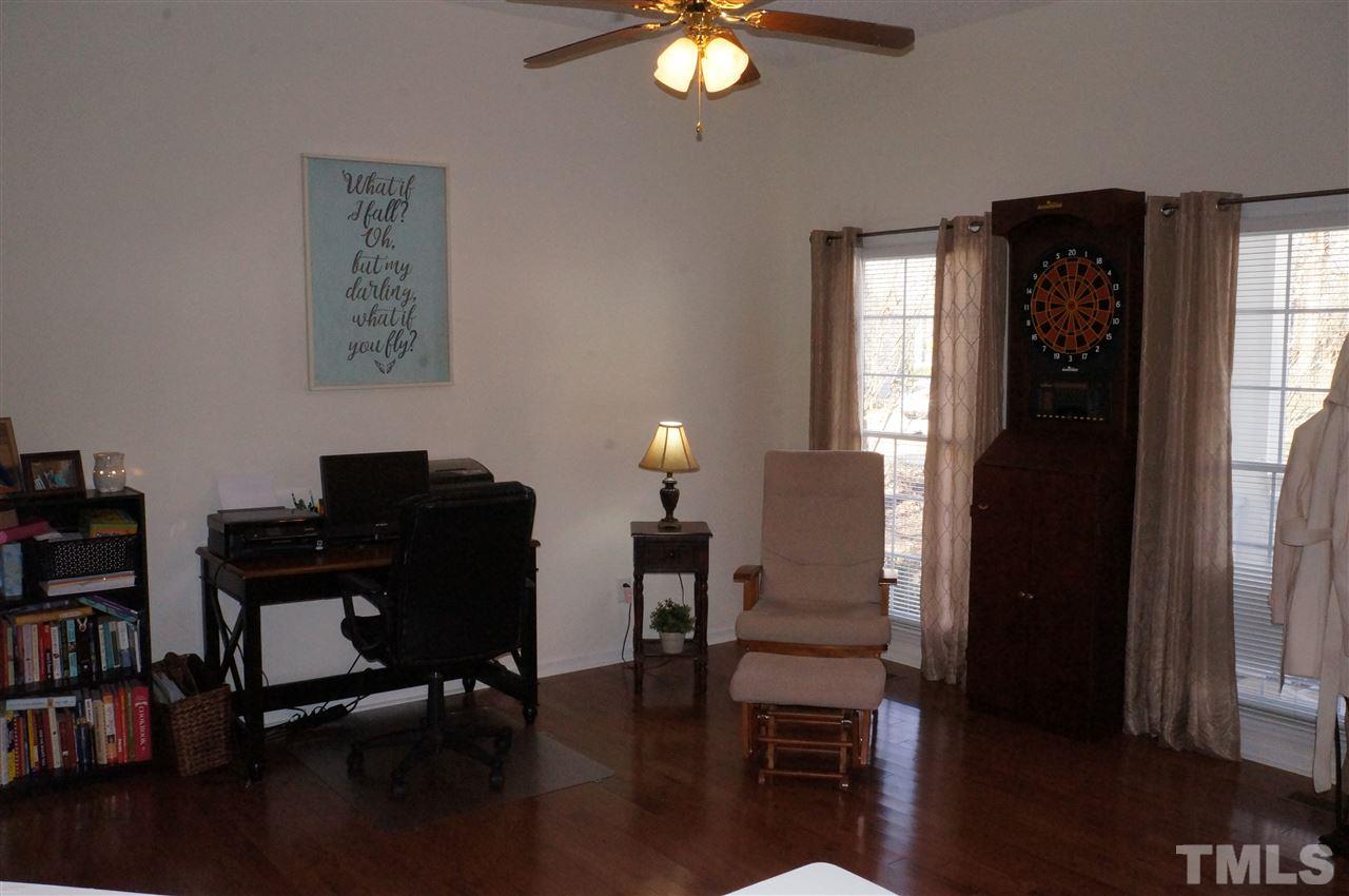 5121 Fairmead Circle Raleigh, NC 27613 - Photo 5 of 21 a view of a workspace with furniture and a window