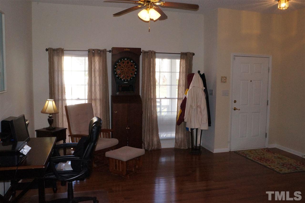 5121 Fairmead Circle Raleigh, NC 27613 - Photo 6 of 21 a living room with furniture and wooden floor