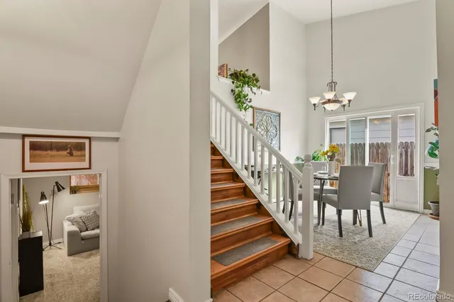 a view of a dining room with furniture window and entryway