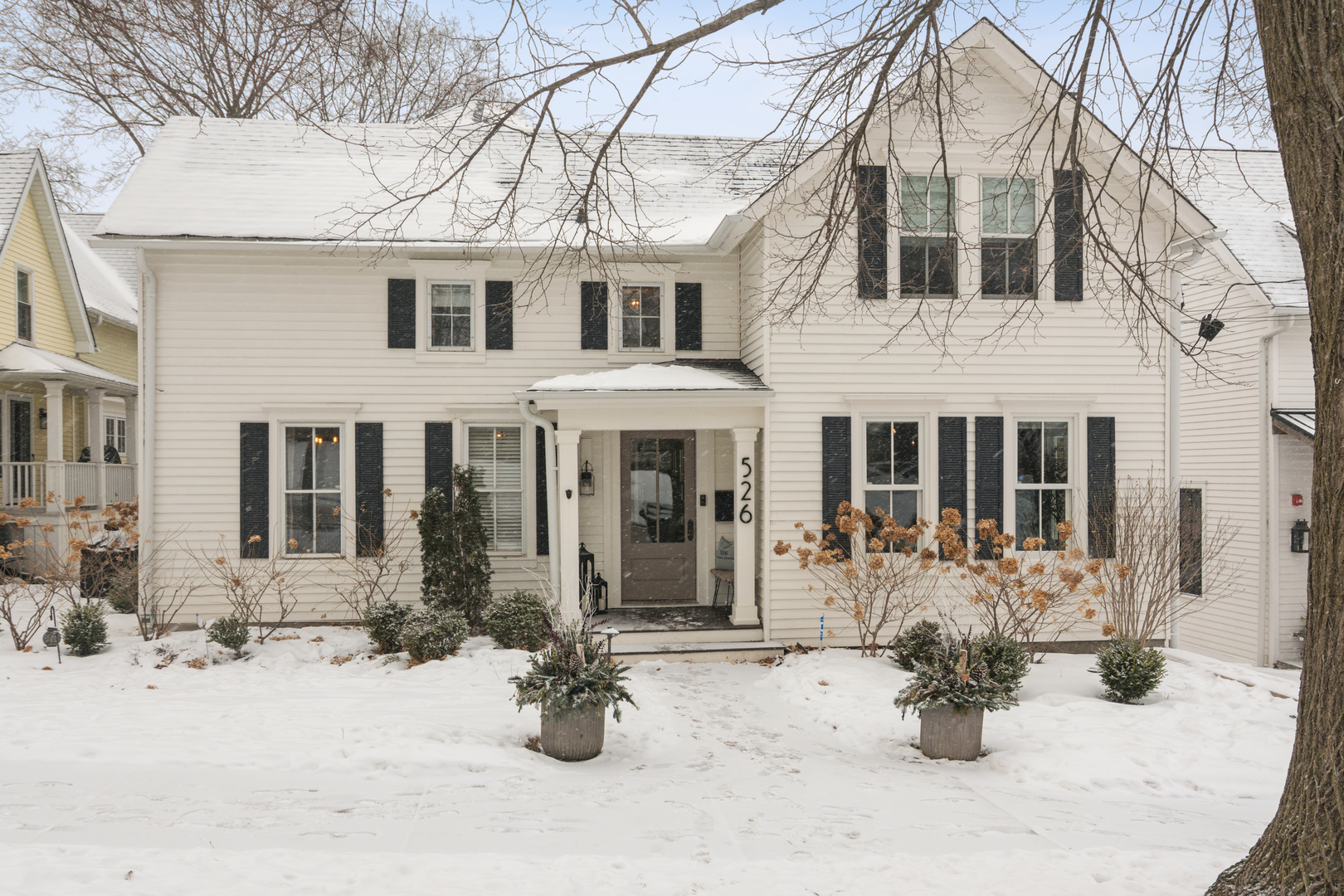 526 South Grove Avenue Barrington, IL 60010 - Photo 1 of 50 a view of a house with snow on the road