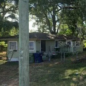 a view of house with outdoor seating space