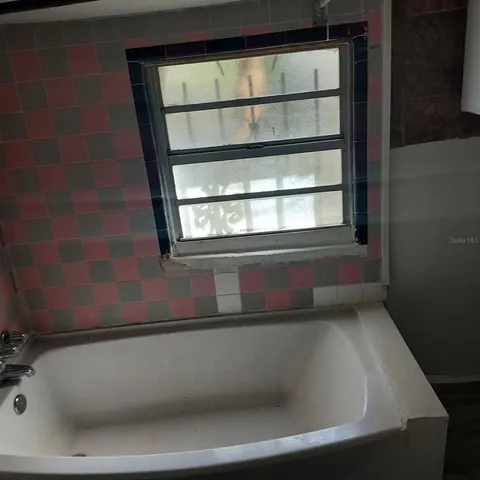 a bathroom with a bathtub