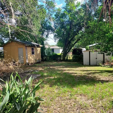 a house view with a garden space