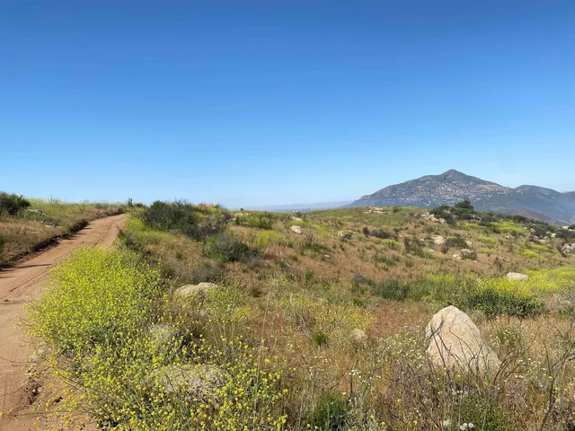 a view of mountain with lake
