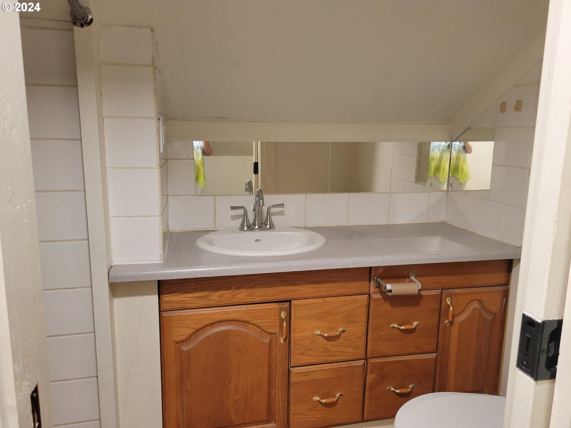 80 South 21st Street St. Helens, OR 97051 - Photo 23 of 28 a bathroom with a sink a toilet and mirror