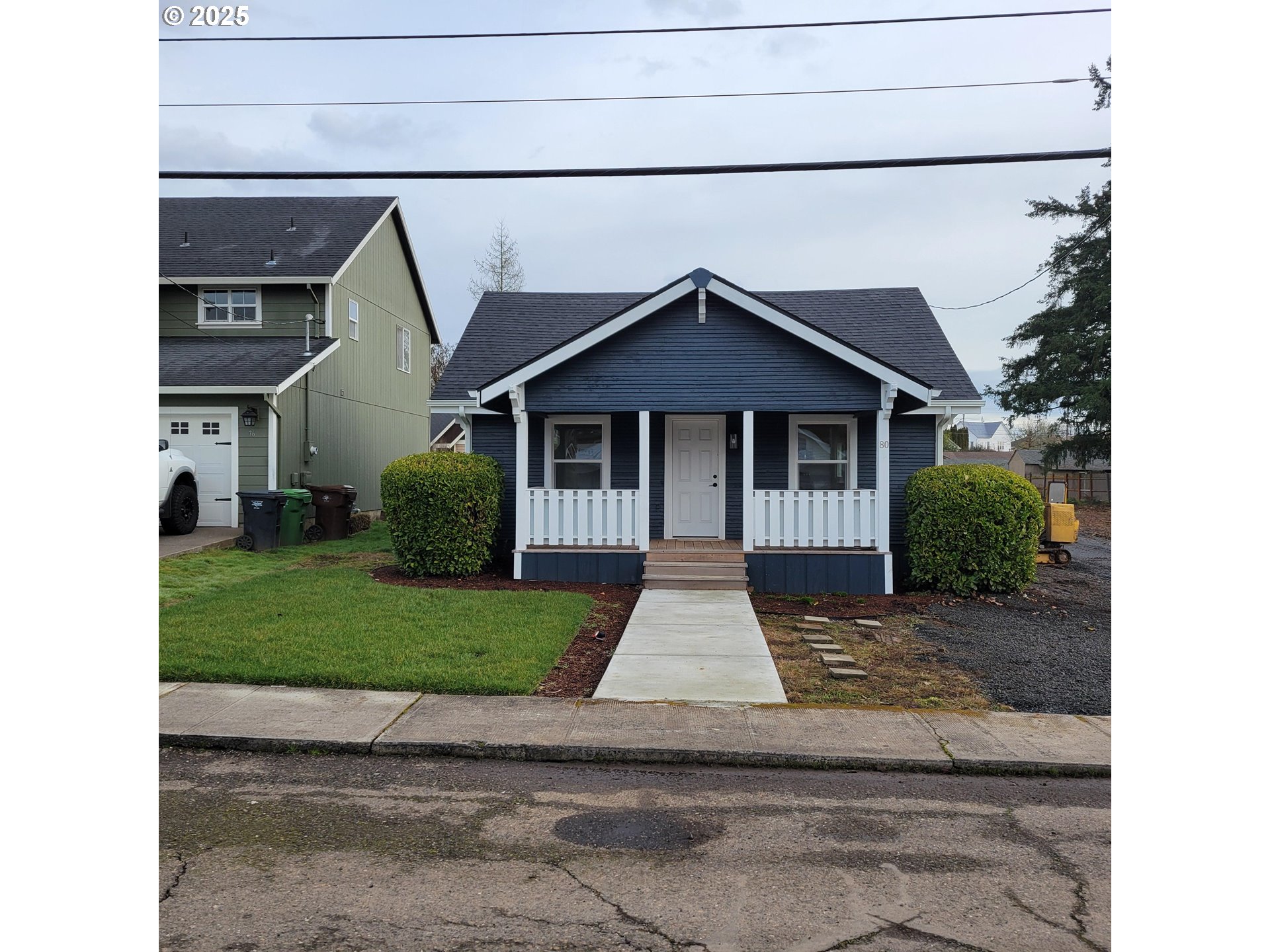 80 South 21st Street St. Helens, OR 97051 - Photo 26 of 28 a front view of a house with a yard