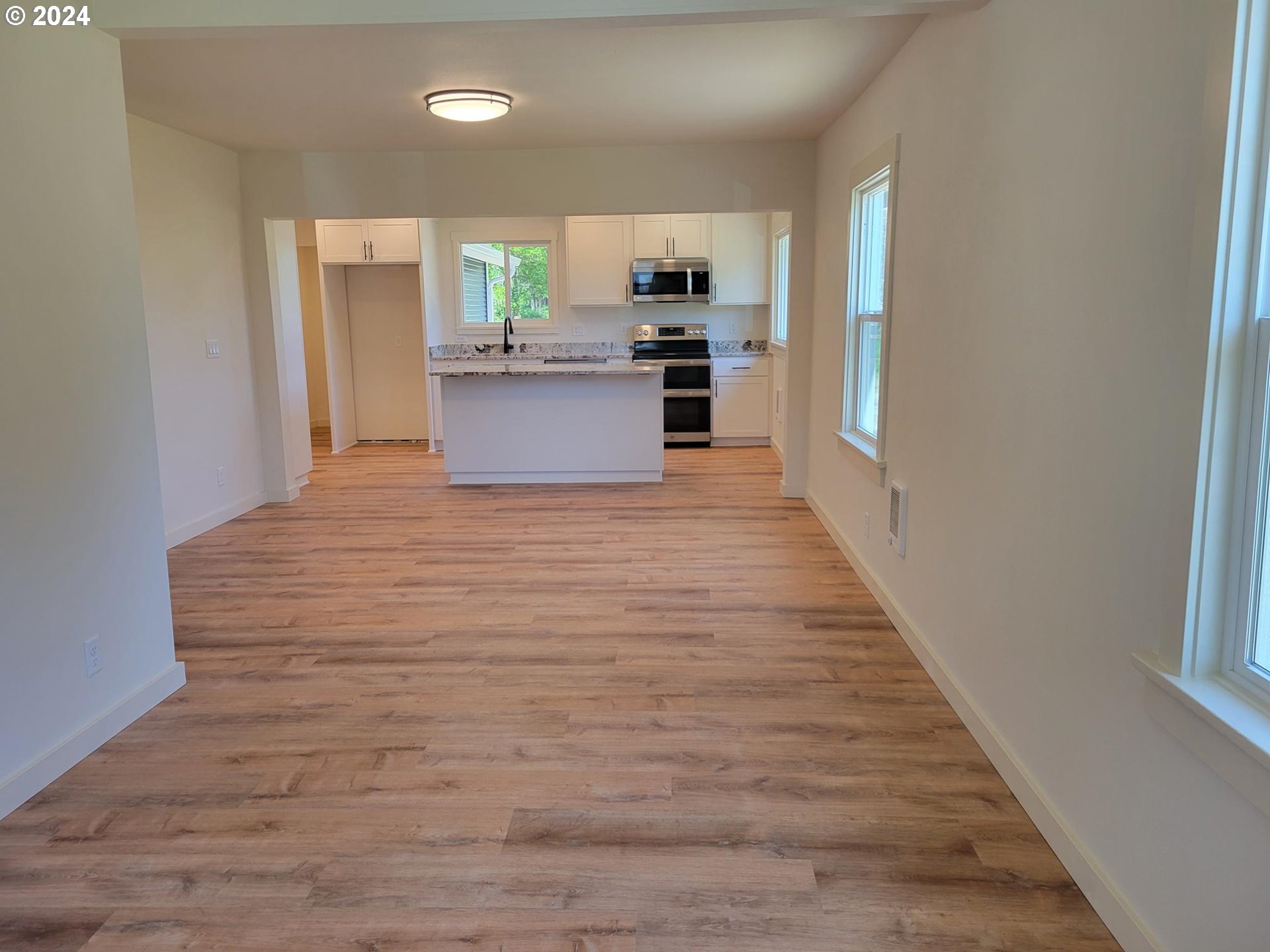 80 South 21st Street St. Helens, OR 97051 - Photo 7 of 28 a view of kitchen with wooden floor
