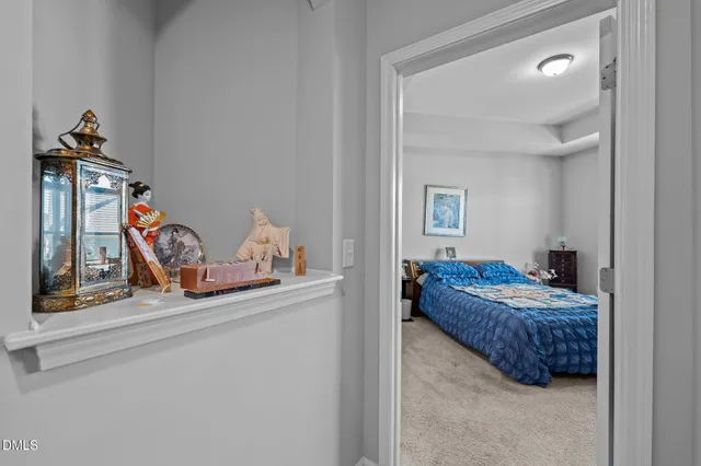 a living room with baby crib