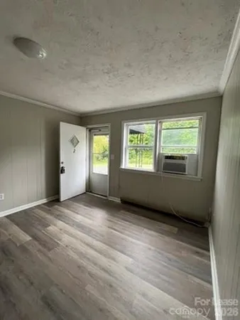 an empty room with windows