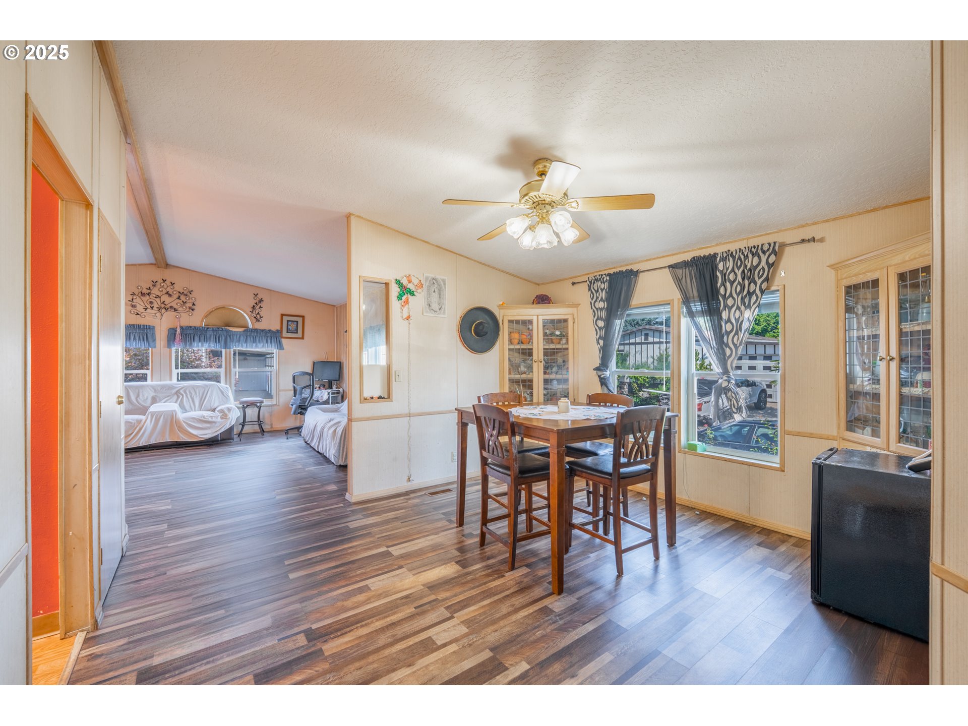 5064 Silver Loop Northeast Salem, OR 97305 - Photo 15 of 27 a view of a livingroom with furniture window and wooden floor