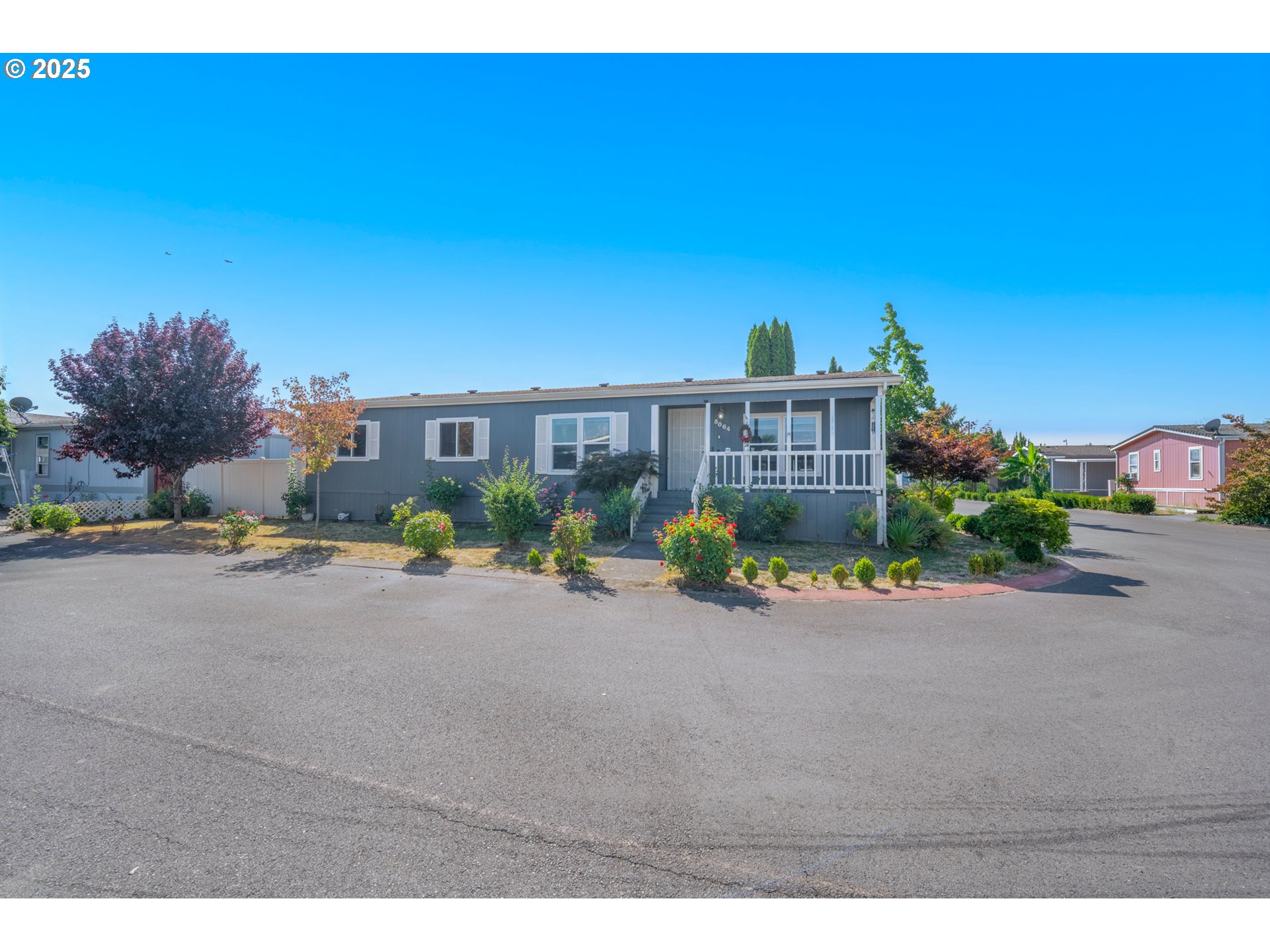 5064 Silver Loop Northeast Salem, OR 97305 - Photo 2 of 27 a view of a house with backyard and sitting area