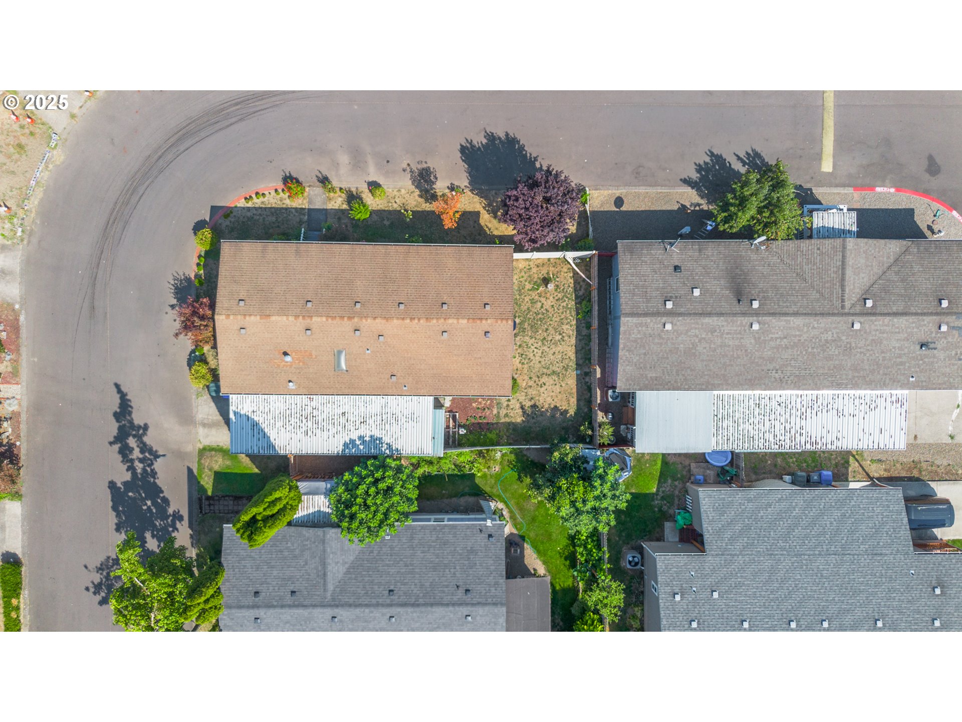 5064 Silver Loop Northeast Salem, OR 97305 - Photo 26 of 27 an aerial view of a house with a yard and black garden