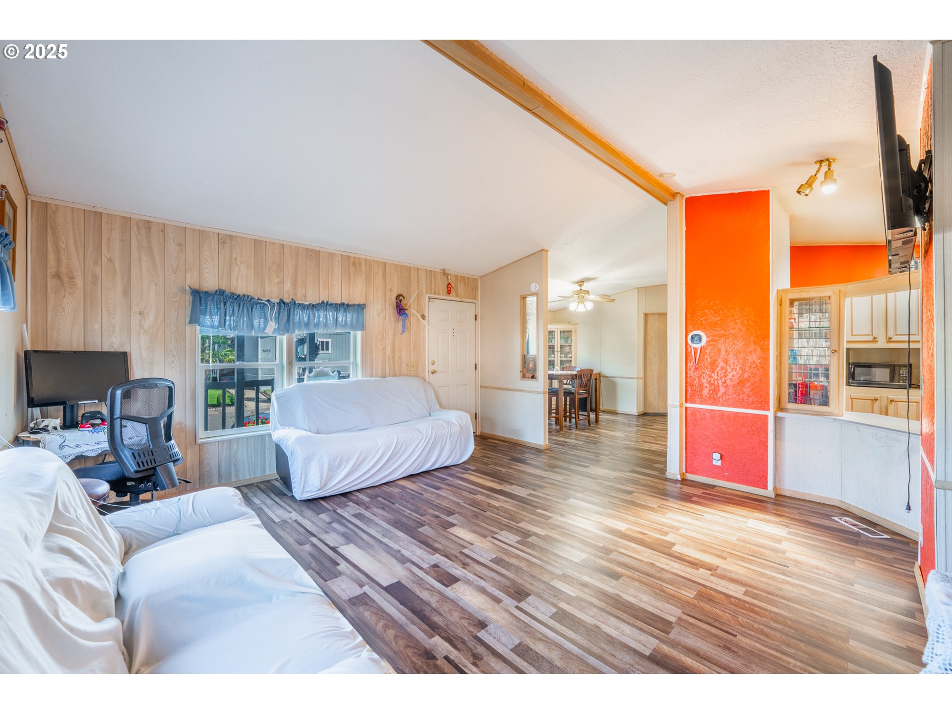 5064 Silver Loop Northeast Salem, OR 97305 - Photo 8 of 27 a living room with furniture and a large window