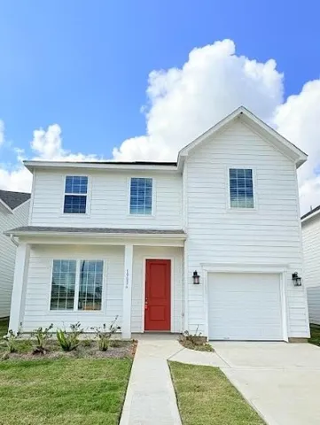 a front view of house with yard