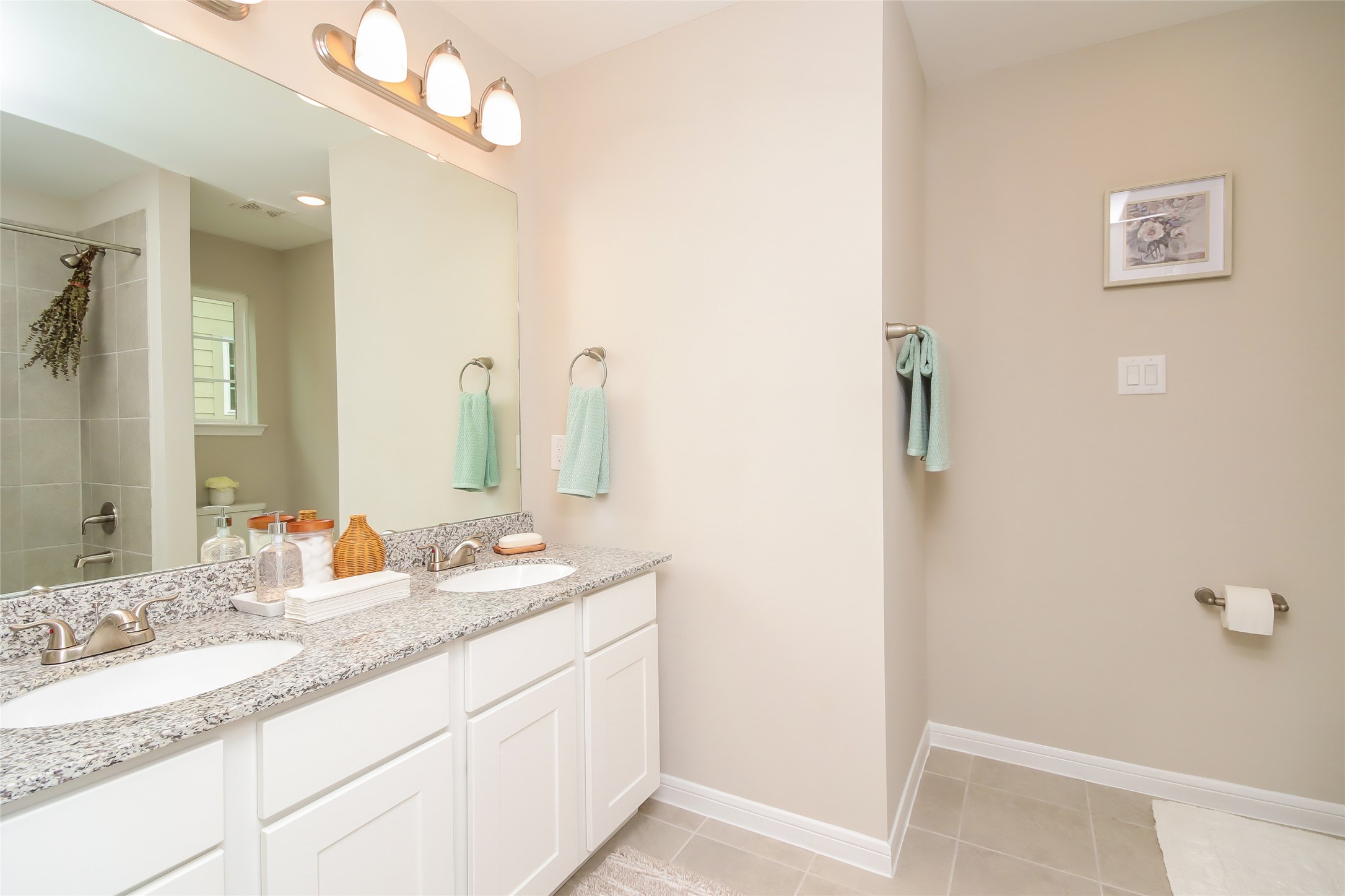 19006 Yellow Bells Way Rosharon, TX 77583 - Photo 9 of 24 a bathroom with a double vanity sink and a mirror