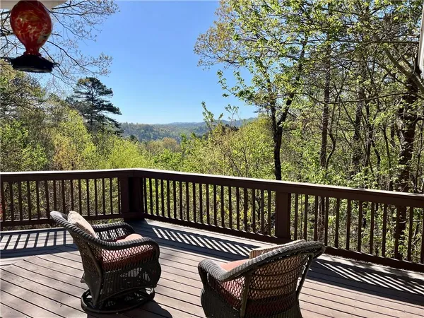 a view of a chair in wooden deck