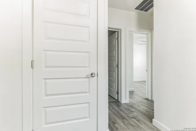 a bathroom with a double vanity sink and mirror