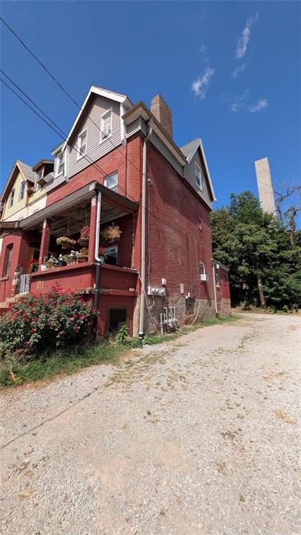211 Coltart Avenue Pittsburgh, PA 15213 - Photo 2 of 5 a view of a house with a yard