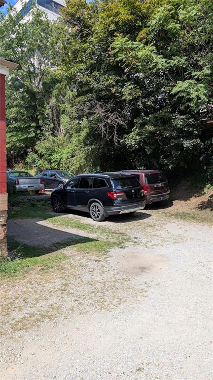 211 Coltart Avenue Pittsburgh, PA 15213 - Photo 4 of 5 a view of backyard with a car parked
