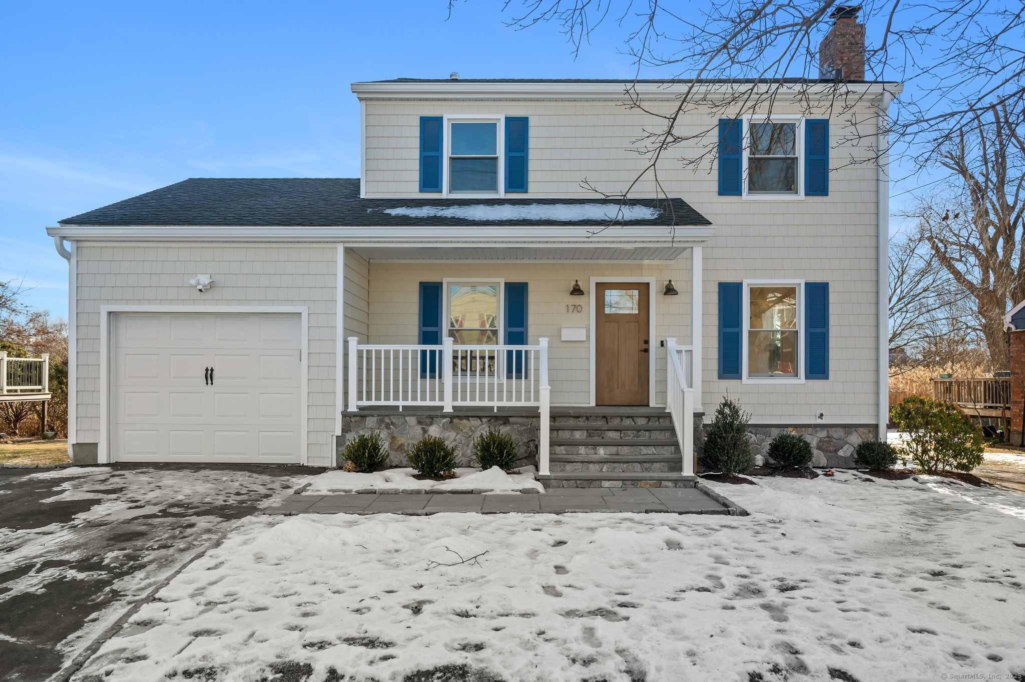 170 Longdean Road Fairfield, CT 06824 - Photo 1 of 1 a front view of a house with a yard