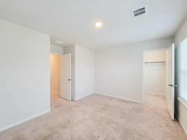 an empty room with a natural light